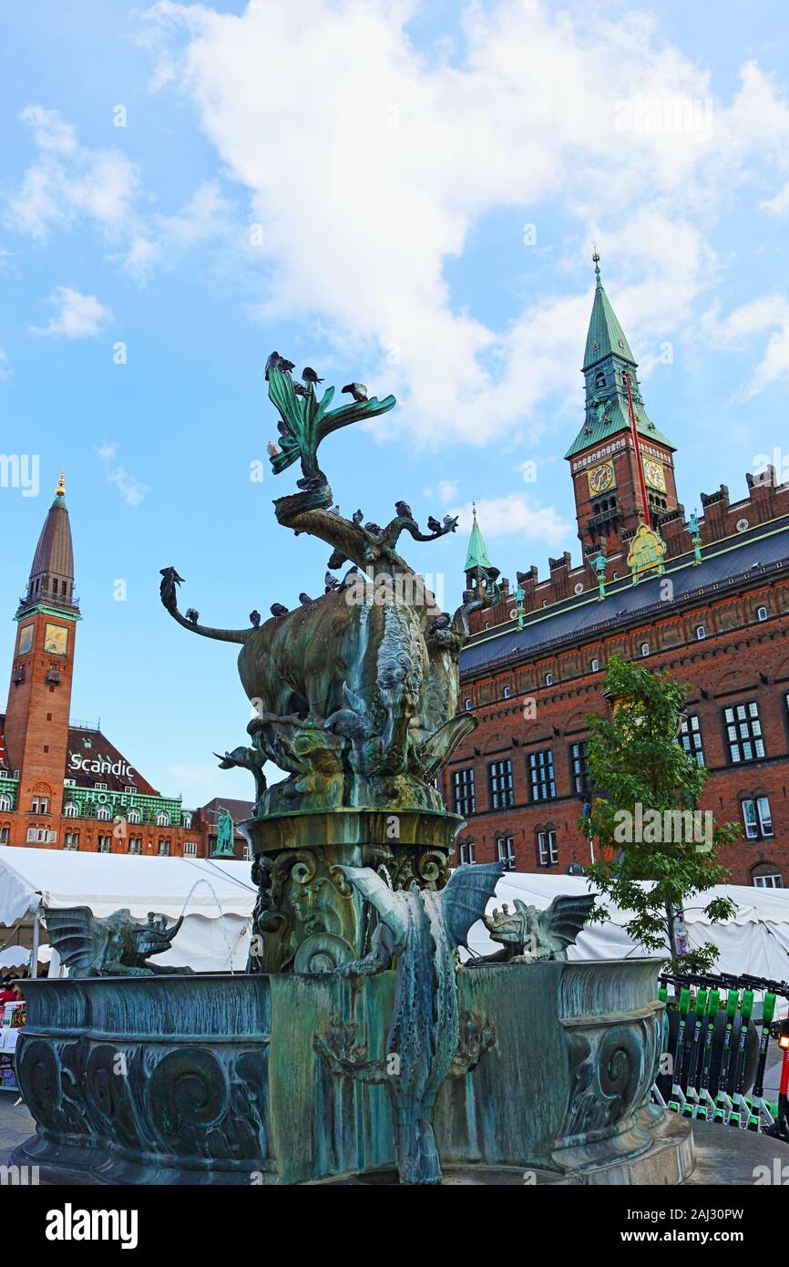 Dragon Fountain at City Hall square and the building with richly